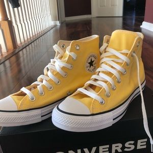 Yellow high top converse